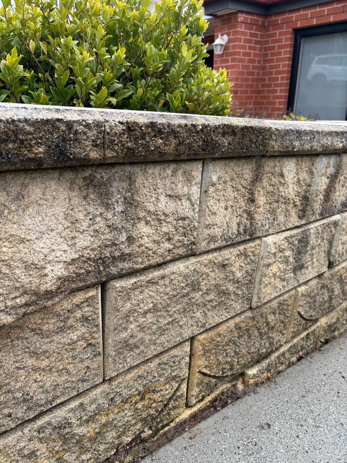 Retaining wall cleaning example by SS Exterior Services in Kilmore and Mitchell Shire